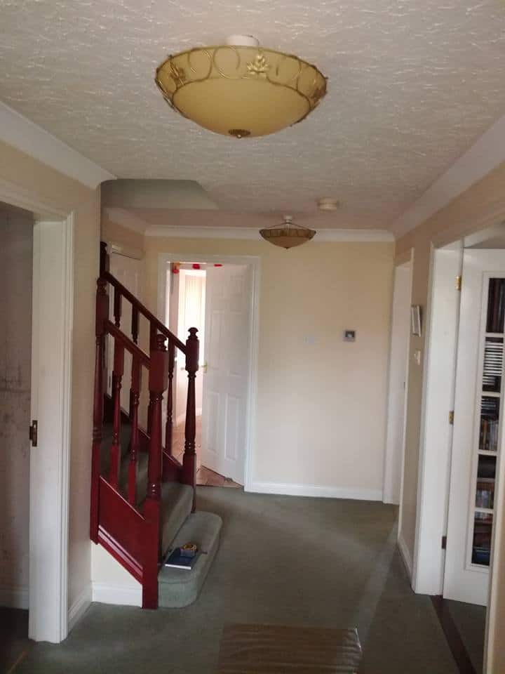 Hallway before Juby Interior Design.