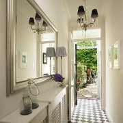 Mirror in a narrow hallway.